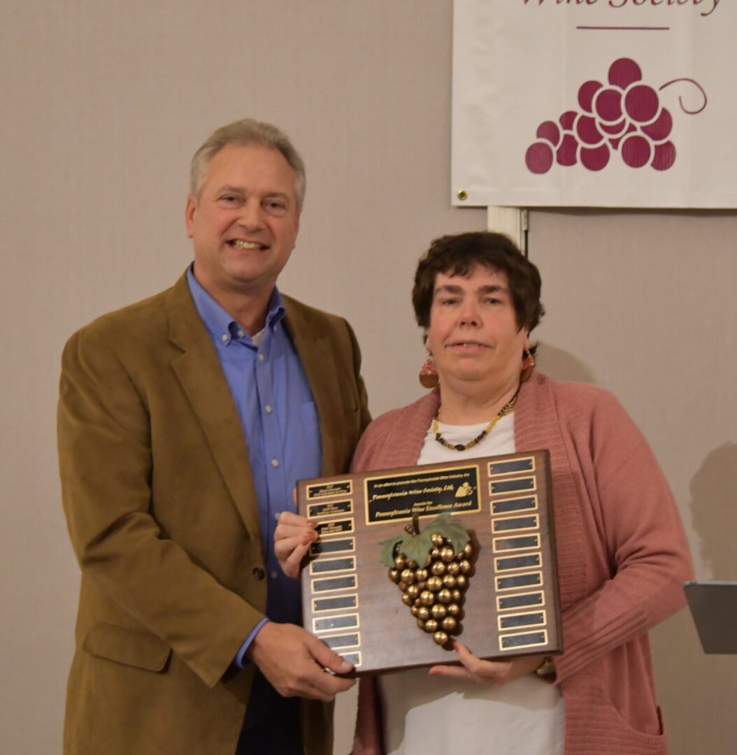 Jan Waltz Accepting the Top Award from PWS President, Robyn Meadows
