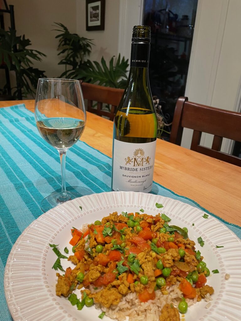 Curry and Sauv Blanc With a Wine Bottle