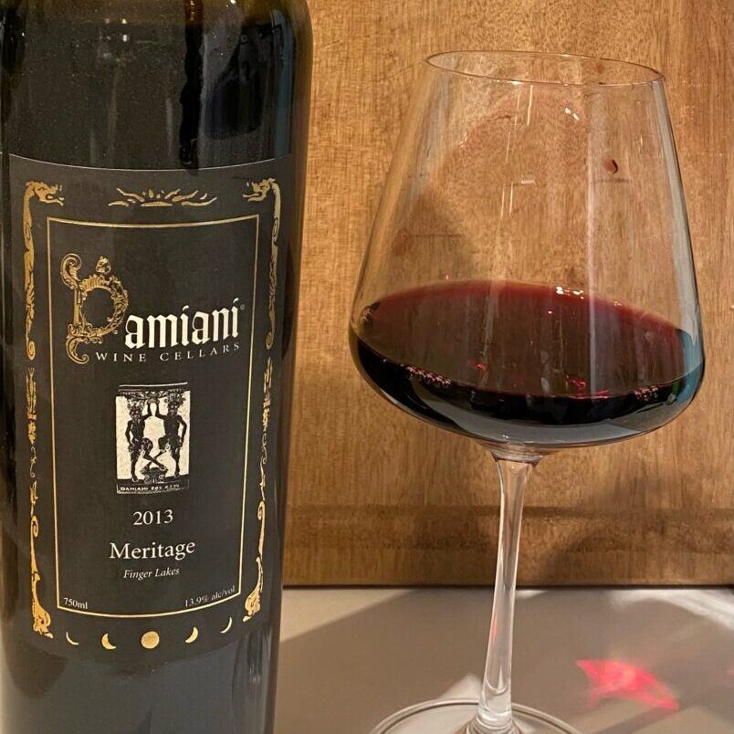 A Wine Bottle Placed Beside a Wine Glass