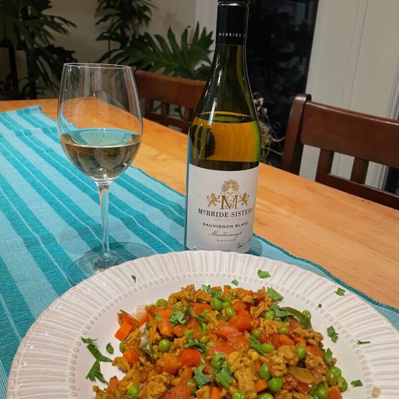 Curry and Sauv Blanc With a Wine Bottle