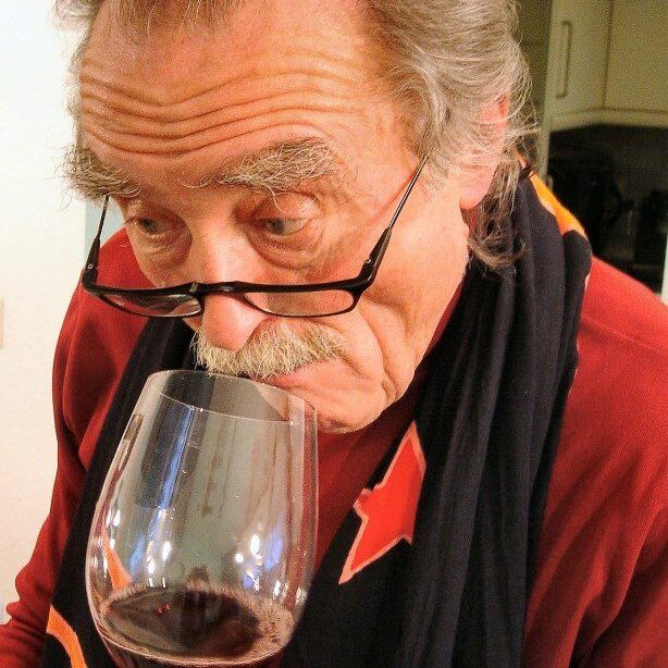 Man in Smoking Jacket Tasting Wine