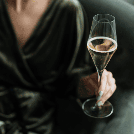 Woman in Green with Champagne Tulip flute